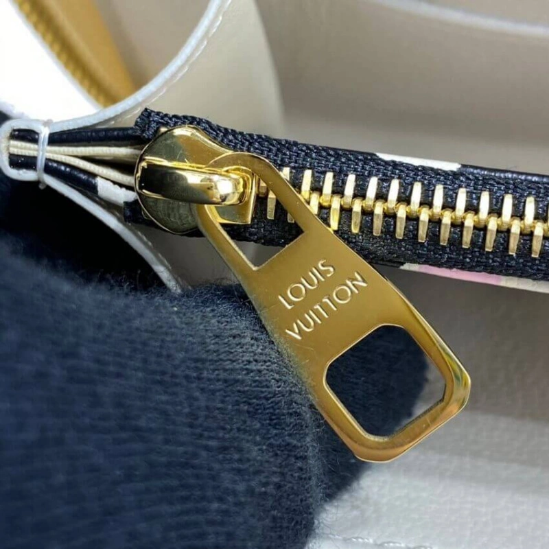 Louis Vuitton Monogram Empreinte Leather with Animal-Print Zippy Wallet Cream - Image 7