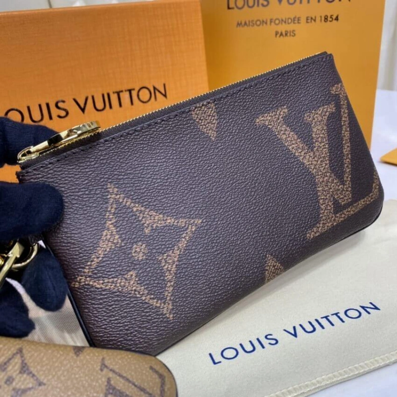 Cowhidele Louis Vuitton Trio Pouch - Image 12