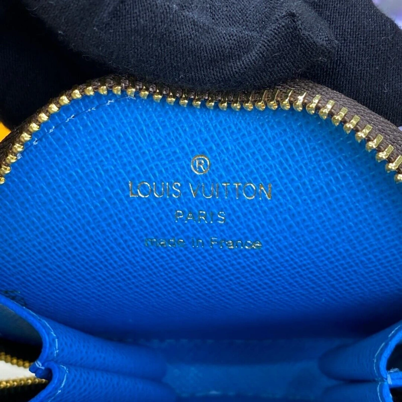 This colle Louis Vuitton Vivienne Holidays Monogram Round Coin Purse Blue - Image 8