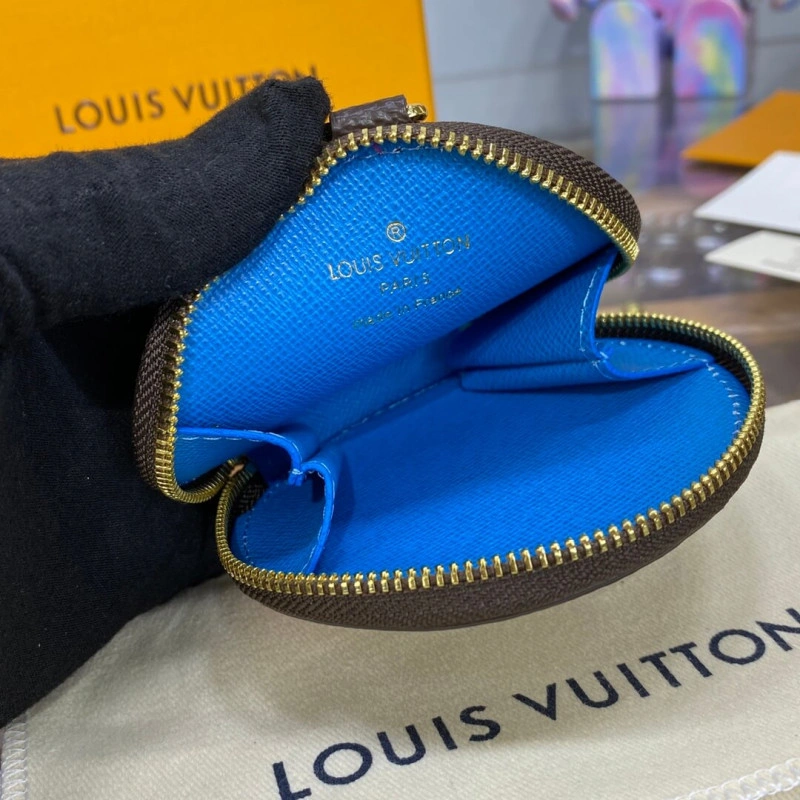 This colle Louis Vuitton Vivienne Holidays Monogram Round Coin Purse Blue - Image 10